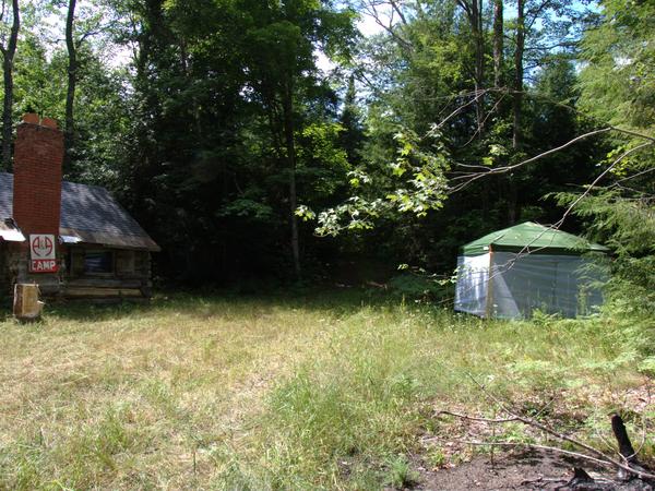 Location of the screened in shelter with respect to the Cabin.