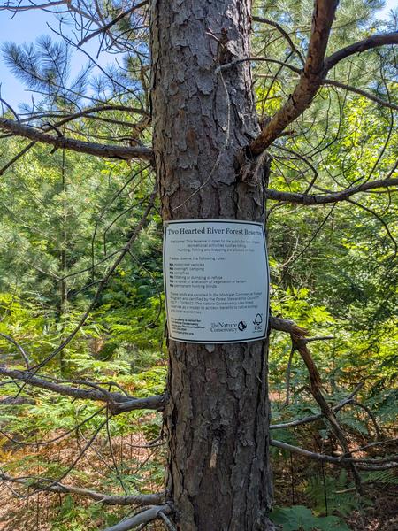 Sign along the road heading past the ridge between two of the Barfield Lakes.