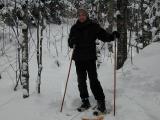Me standing in the snow with snowshoes on
