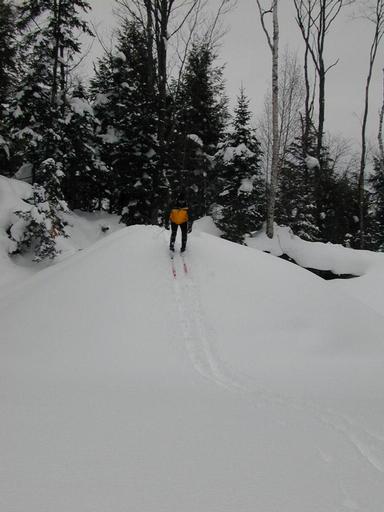 Matt skiing down the steep hill.