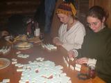 Vittoria and Amelia playing dominoes.