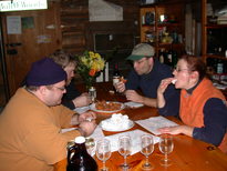 Jon, Bill, me, and Amelia eating donuts.