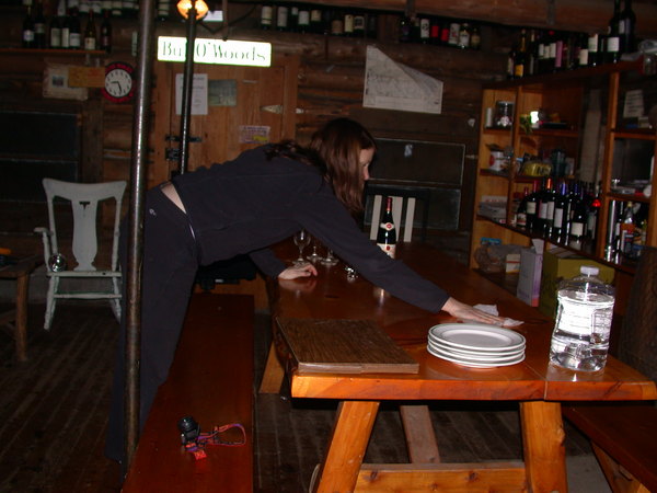 Vittoria cleaning the table for dinner.