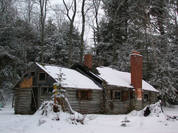 Cabin after a light snow.