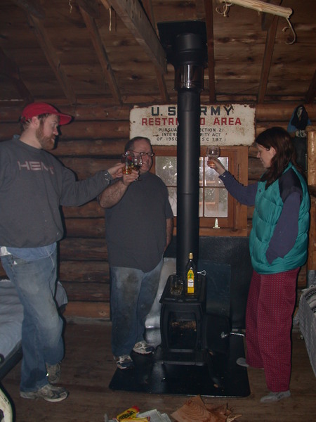 Bill, Jon, and Vittoria toasting the new stove.
