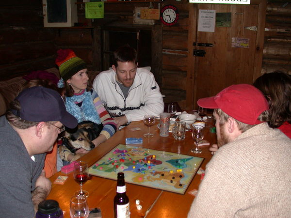 Jon, Amelia, Abby, Katie, Jon, Vittoria, and Bill playing
	     Risk.