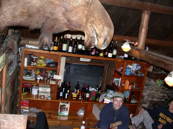 Craig in a rare picture.  Here with the Moose and wine bottles.