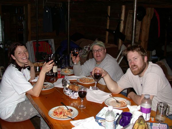 Vittoria, Jon, Bill, and wine at dinner.