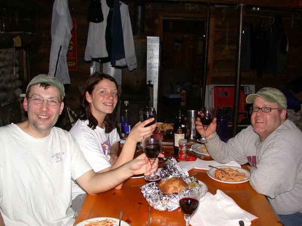 Craig, Vittoria, Jon, and wine at dinner.