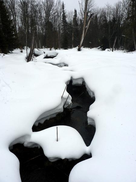 Small creek I crossed while snowshoeing.