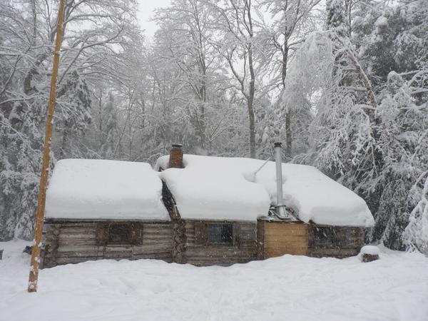 The Cabin as it snows.