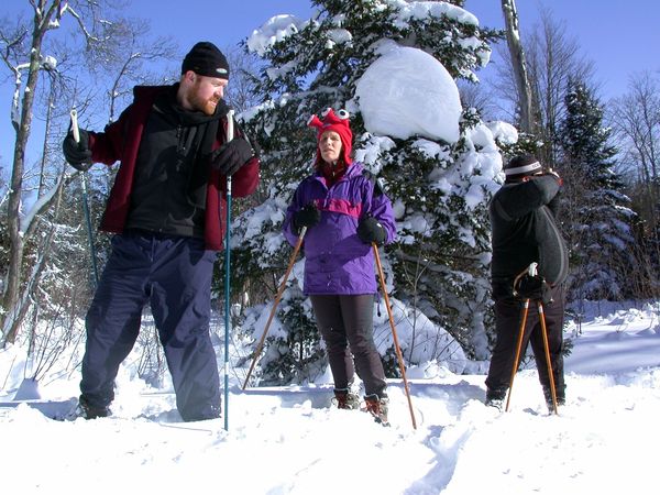 Bill, Amelia, and Jon taking a short break in the snowshoeing.