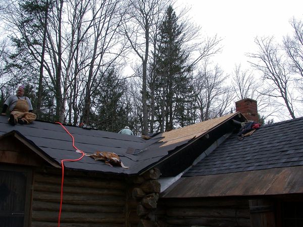 Most of the back of the roof with tar paper.