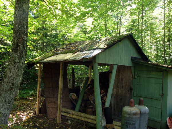 Wood shed in bad shape.