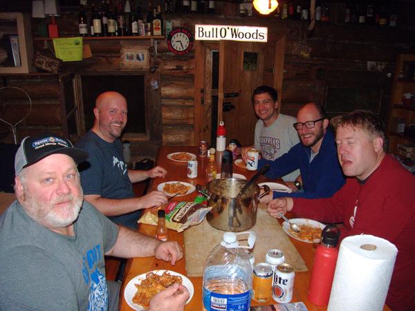 Jon, Jim, Mikey, Andy, and Bill. The guys having dinner.
