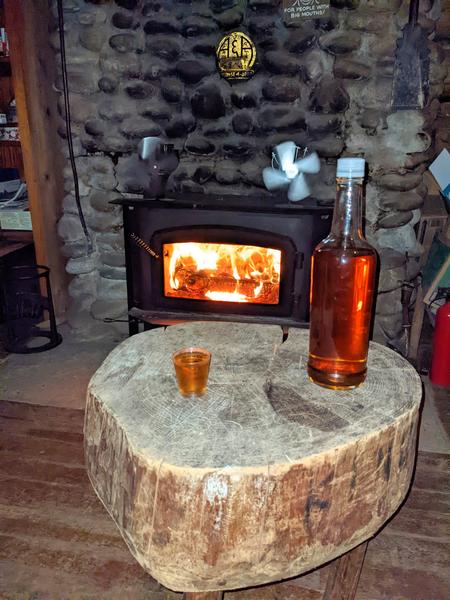 Traditional shot of Krupnik by the fire.
