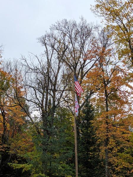 The flags flying over Camp A&A.