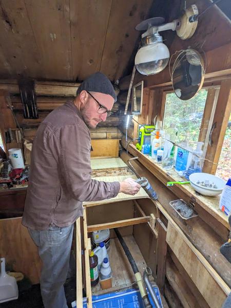 Andy working on replacing the countertop.