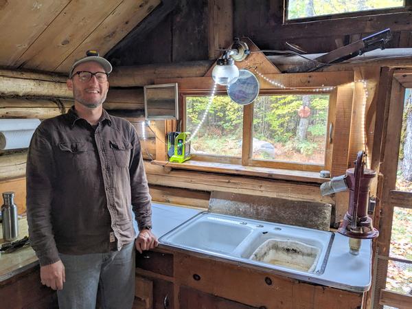 Andy proudly showing off the completed countertop installation.