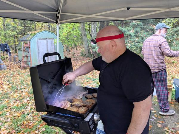 Jon cooking on the flat top outside.