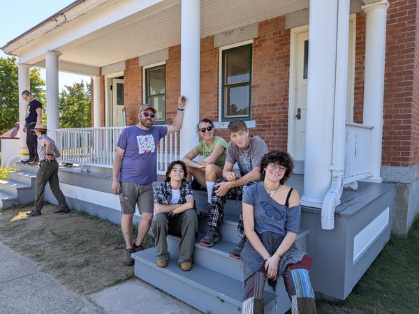 Most of the group on the porch of Au Sable Light Station: BIll, Nadia, Frank, Carina, and Zaria.