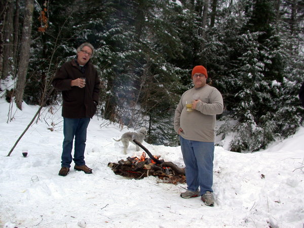 Jon, Carl, and Zuzu by the fire.