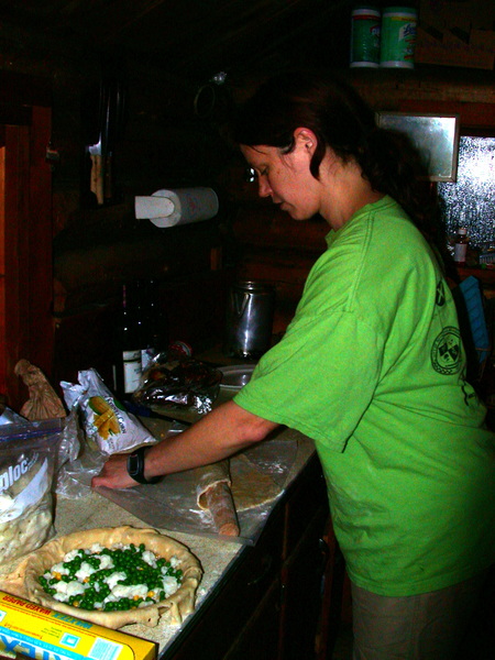 Vittoria rolling out a crust for one of the pot pies.