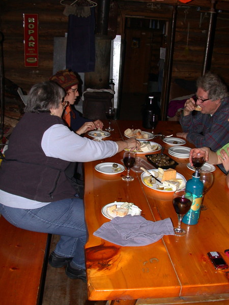 Rose, Amelia, and Carl with cheese and wine before diner.